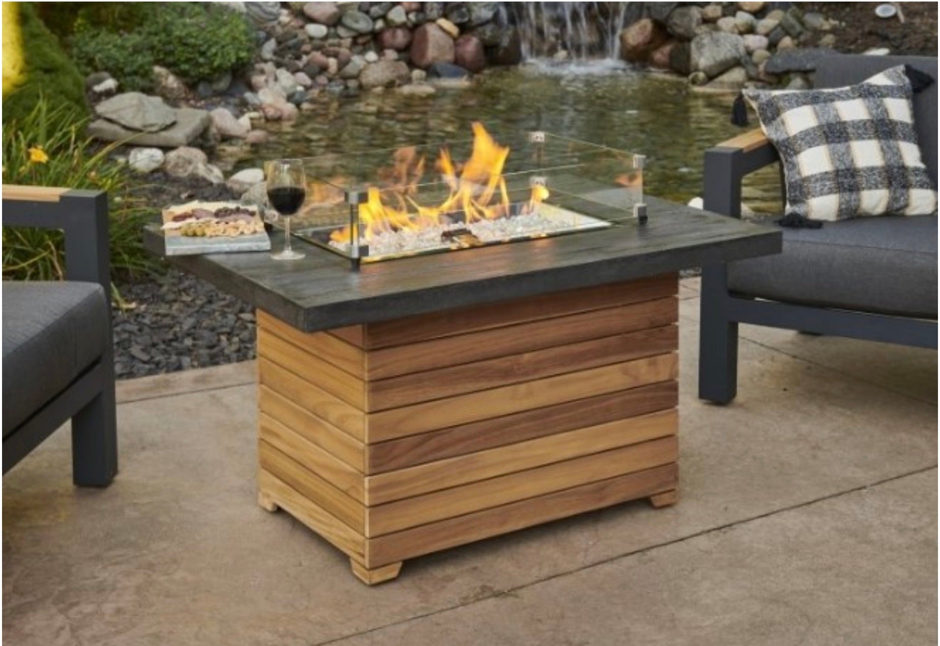 Darien Everblend Rectangular Gas Fire Pit Table - lit on patio